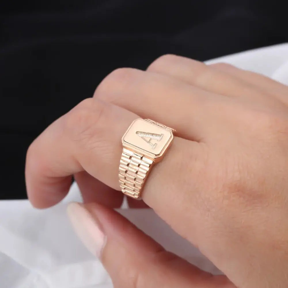 Bague initiale en or rose