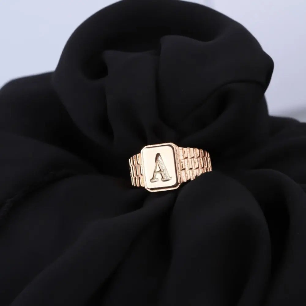 Bague initiale en or rose