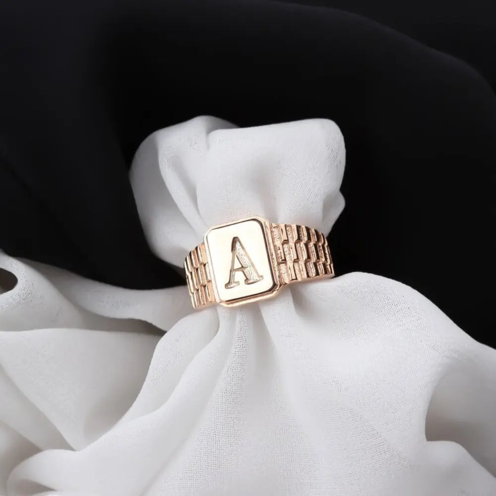 Bague initiale en or rose