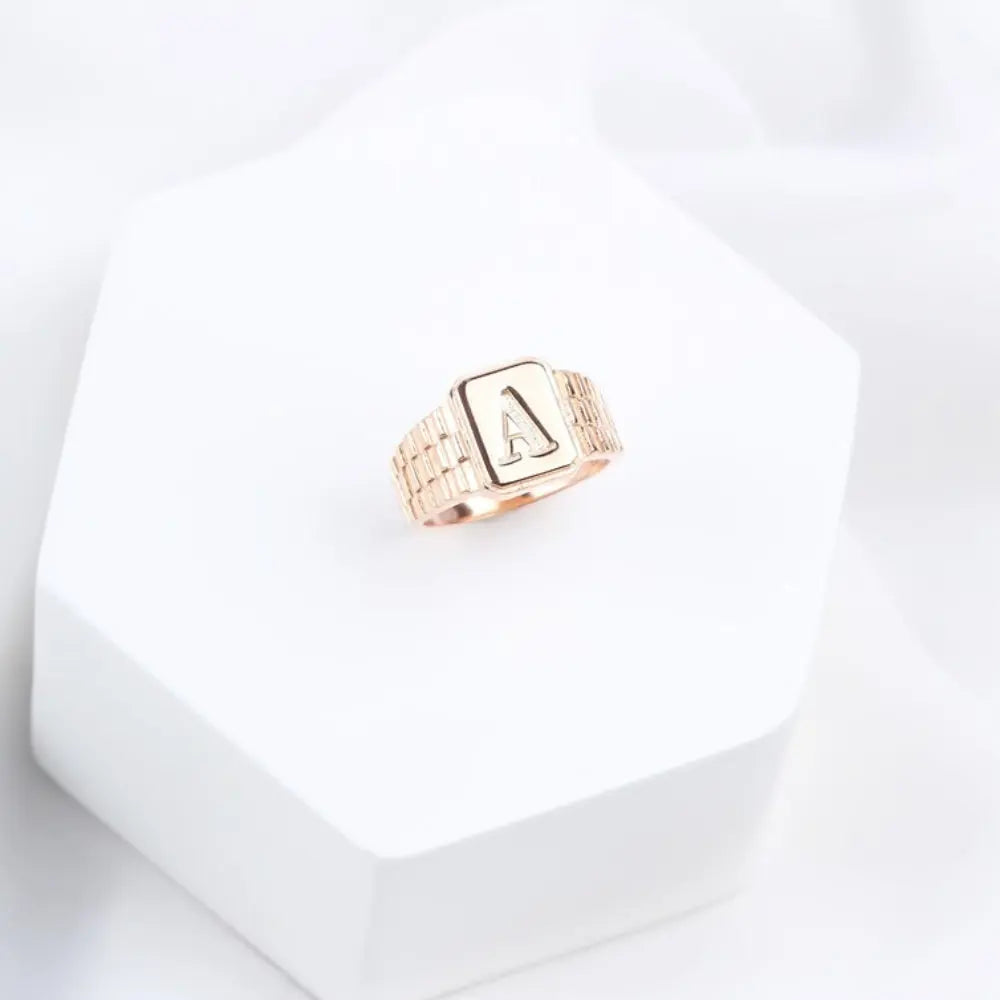 Bague initiale en or rose