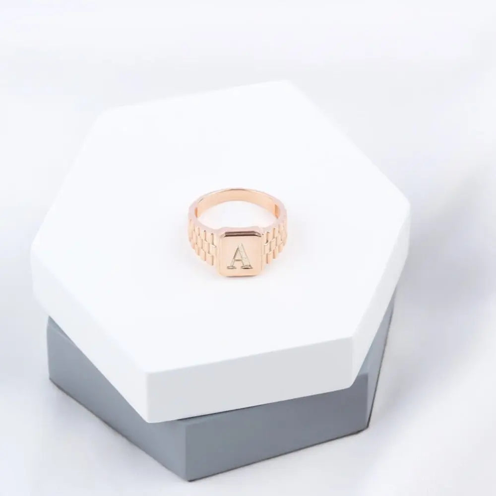 Bague initiale en or rose