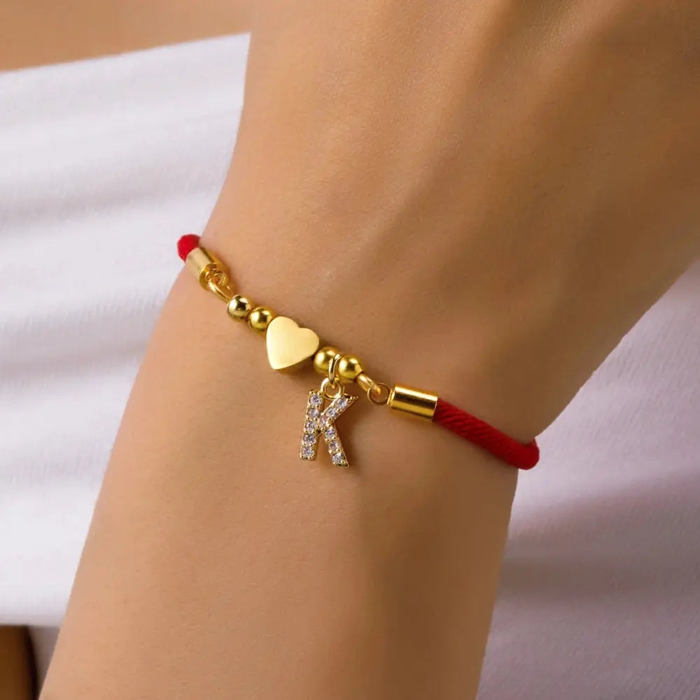 Bracelet initial corde rouge