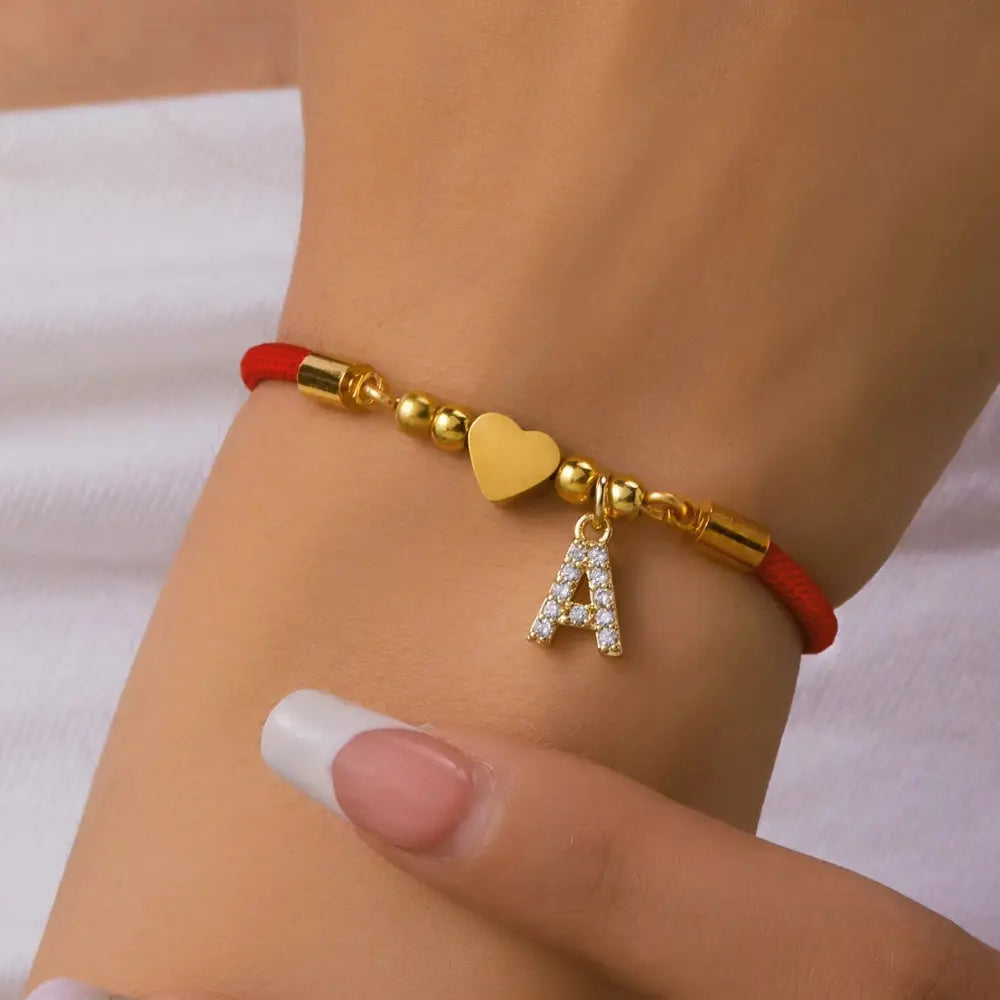 Bracelet initial corde rouge