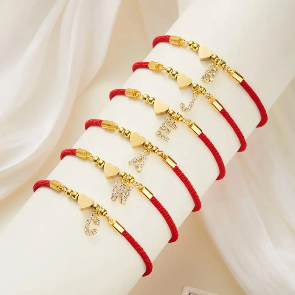 Bracelet initial corde rouge