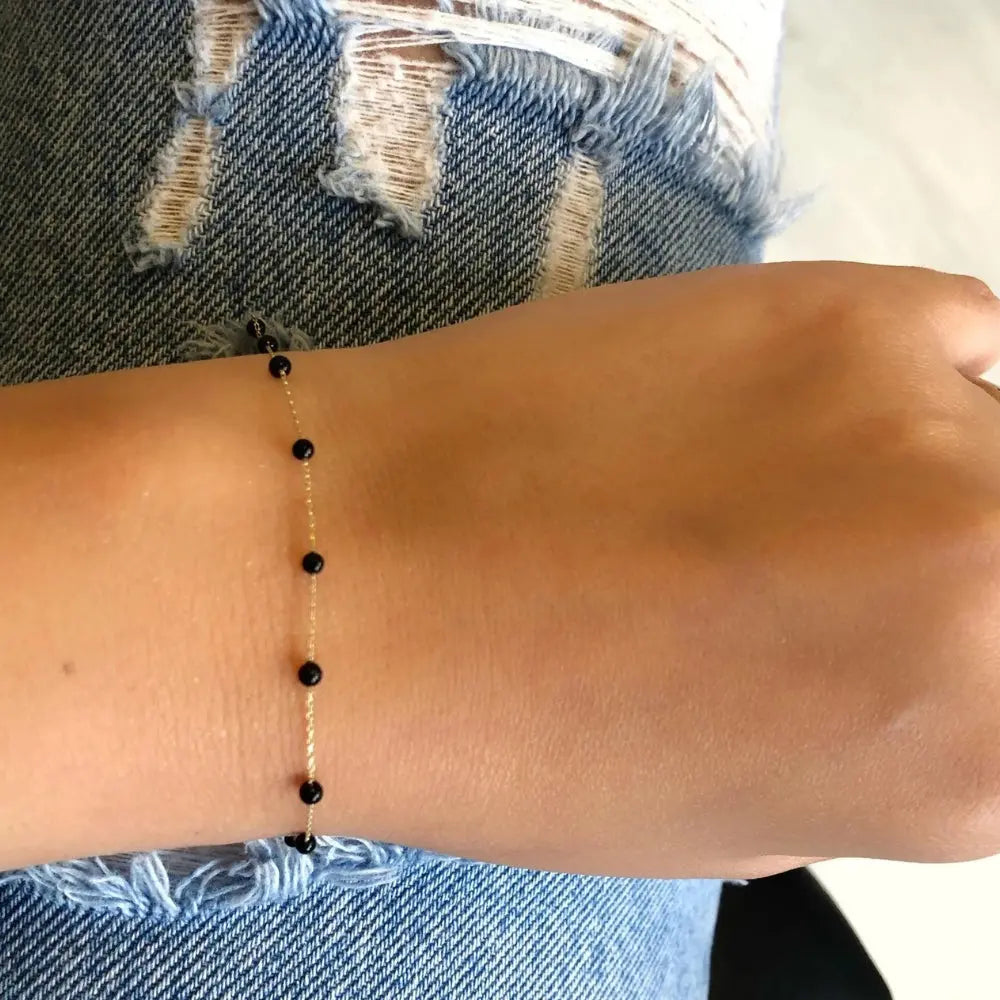 Bracelet or pierres onyx