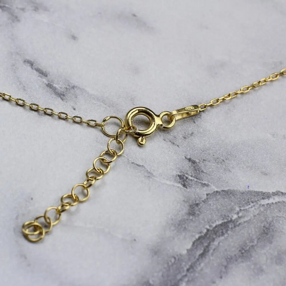 Collier de crâne mignon