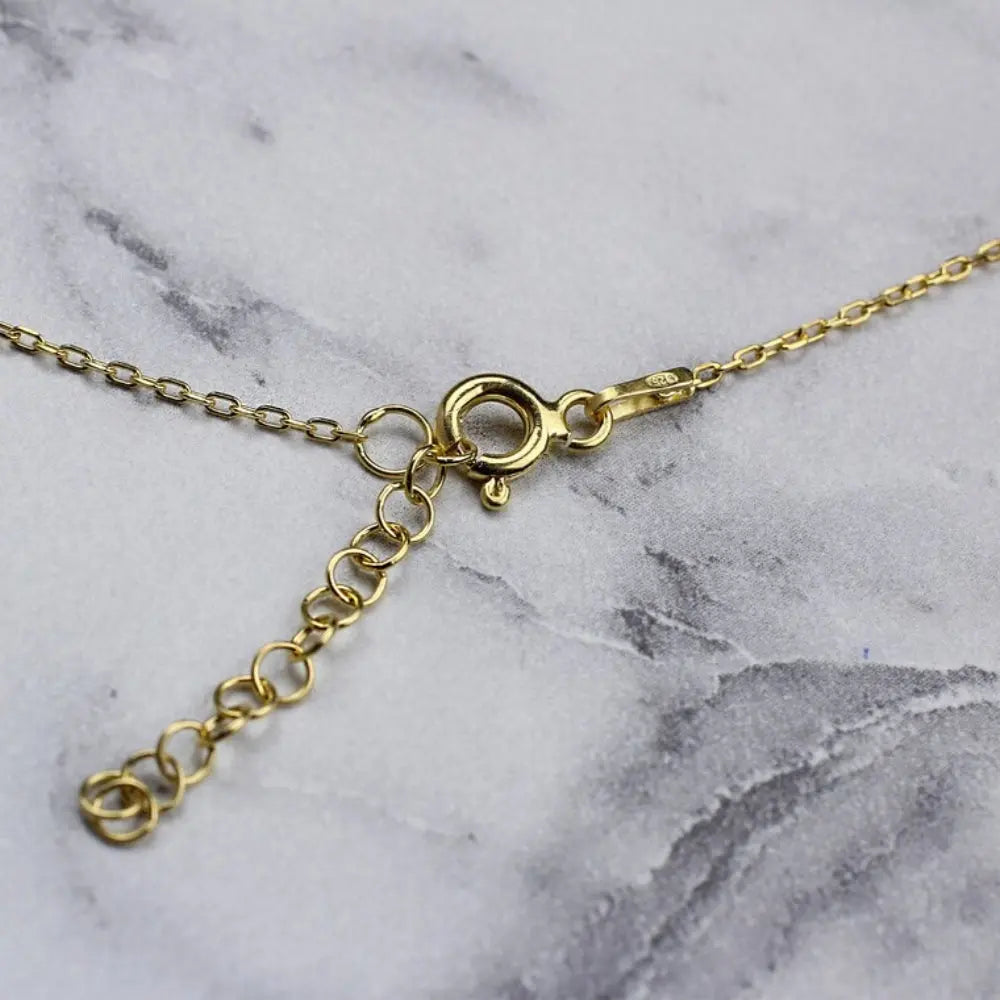 Collier croix d'opale