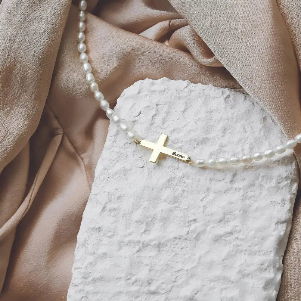 Collier croix perle