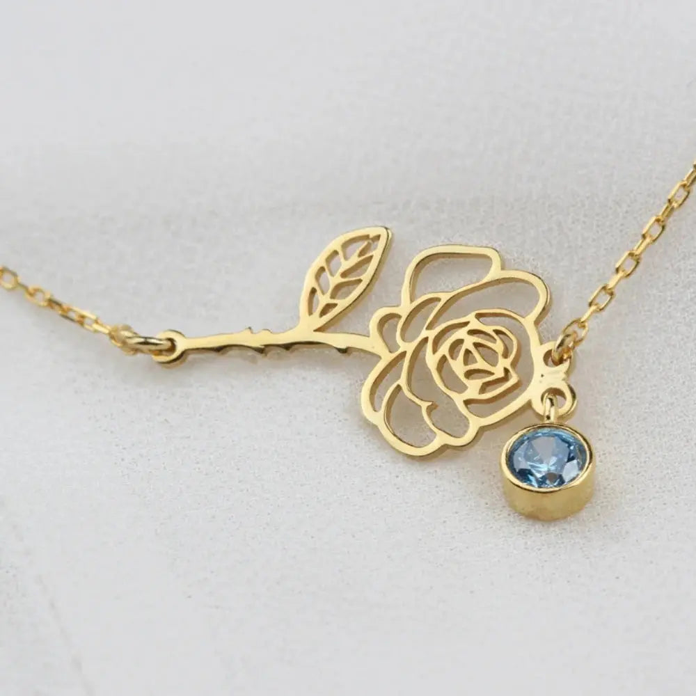 Collier de fleurs de naissance horizontale