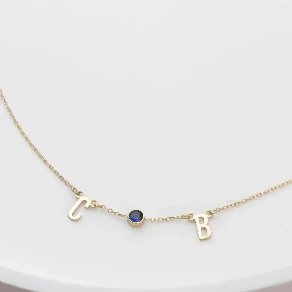 Collier initiales et pierre