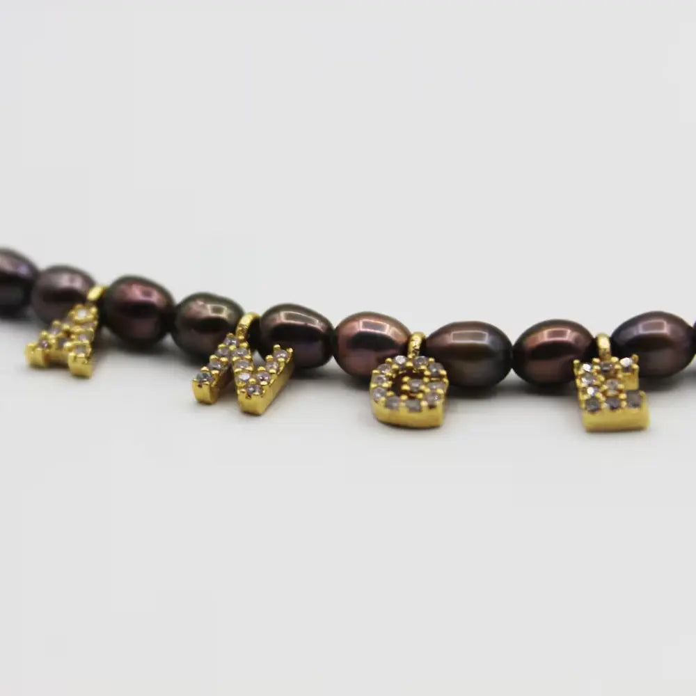 Collier perles noires prénom