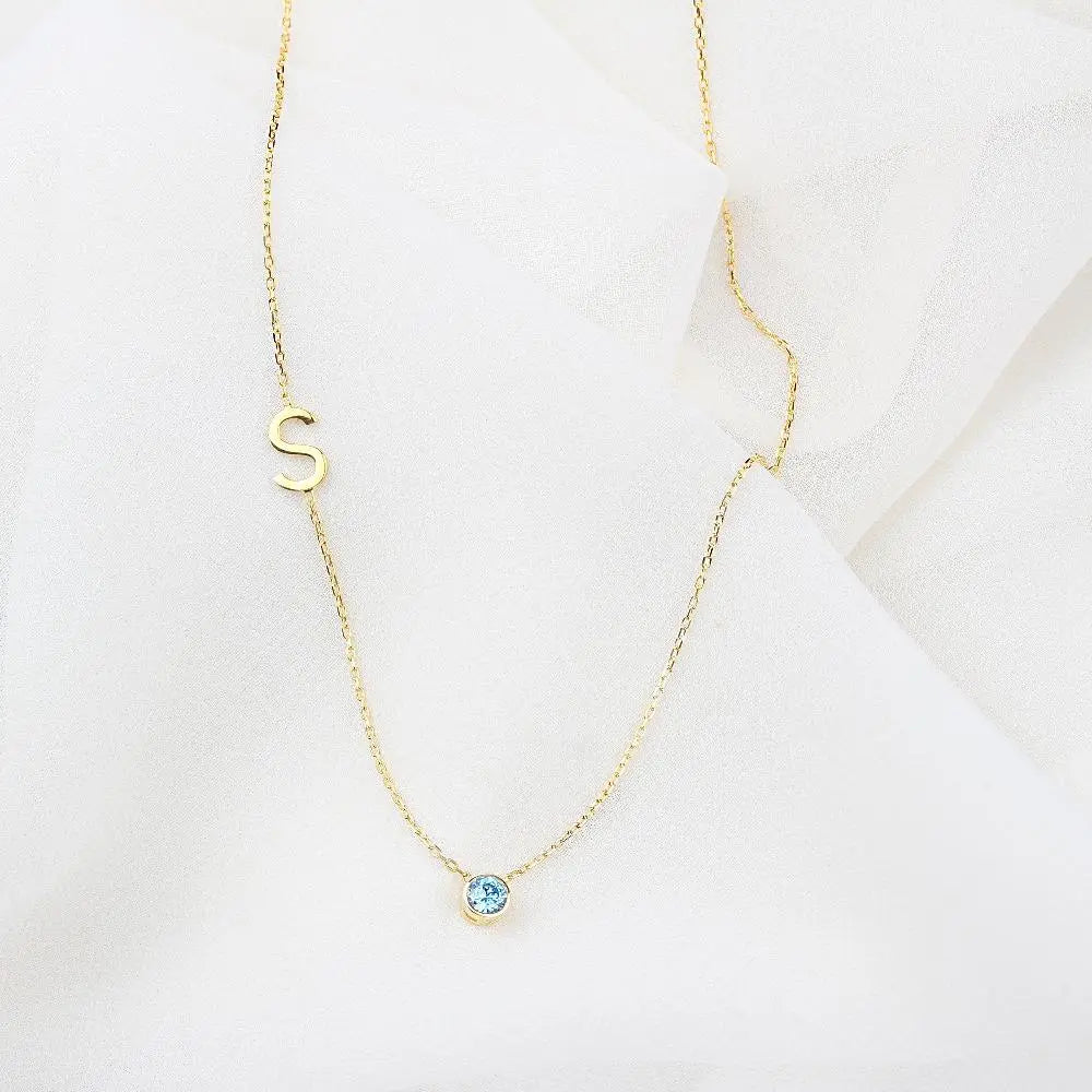 Collier pierre et initiale