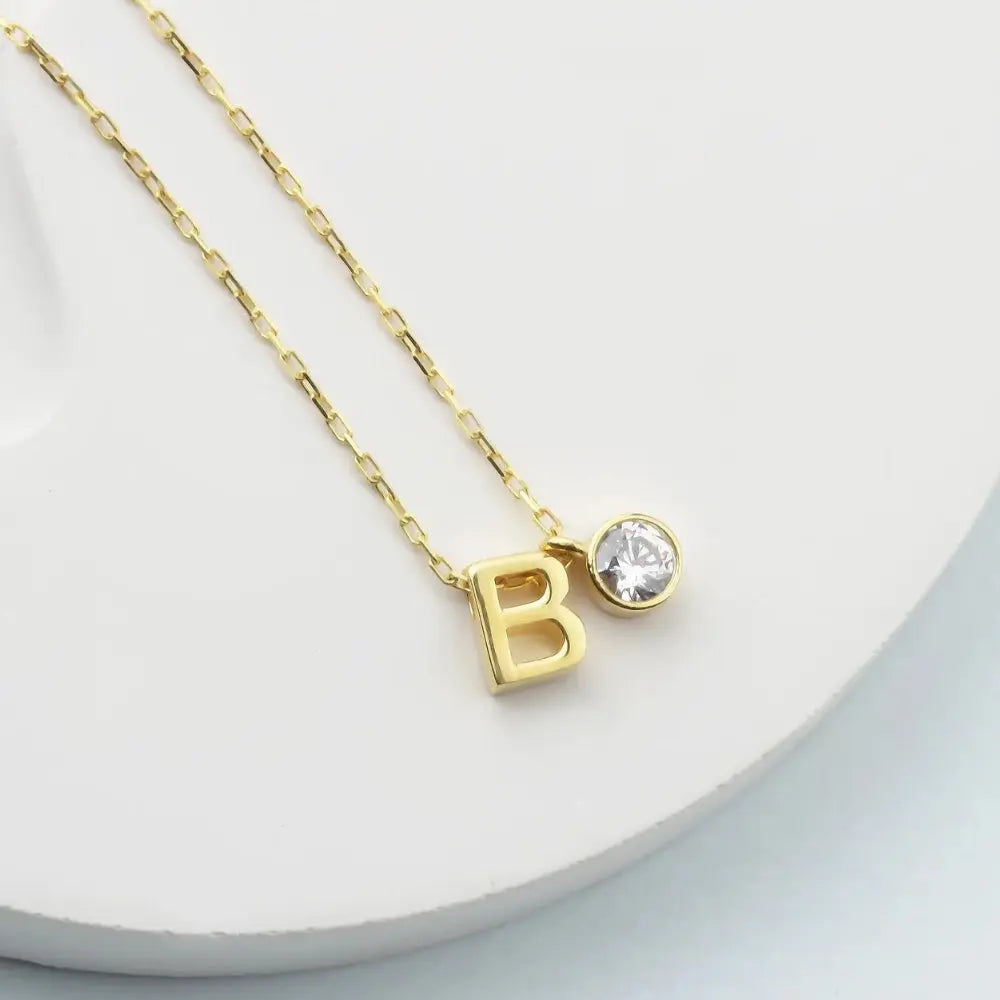 Pendentif initial argent