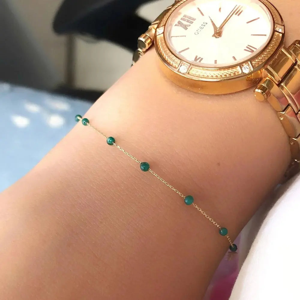 Bracelet or pierres jades 
