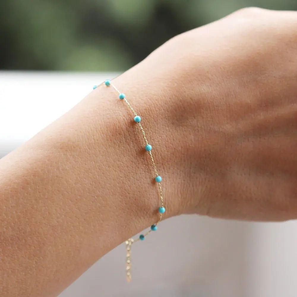 Bracelet or pierres turquoises 