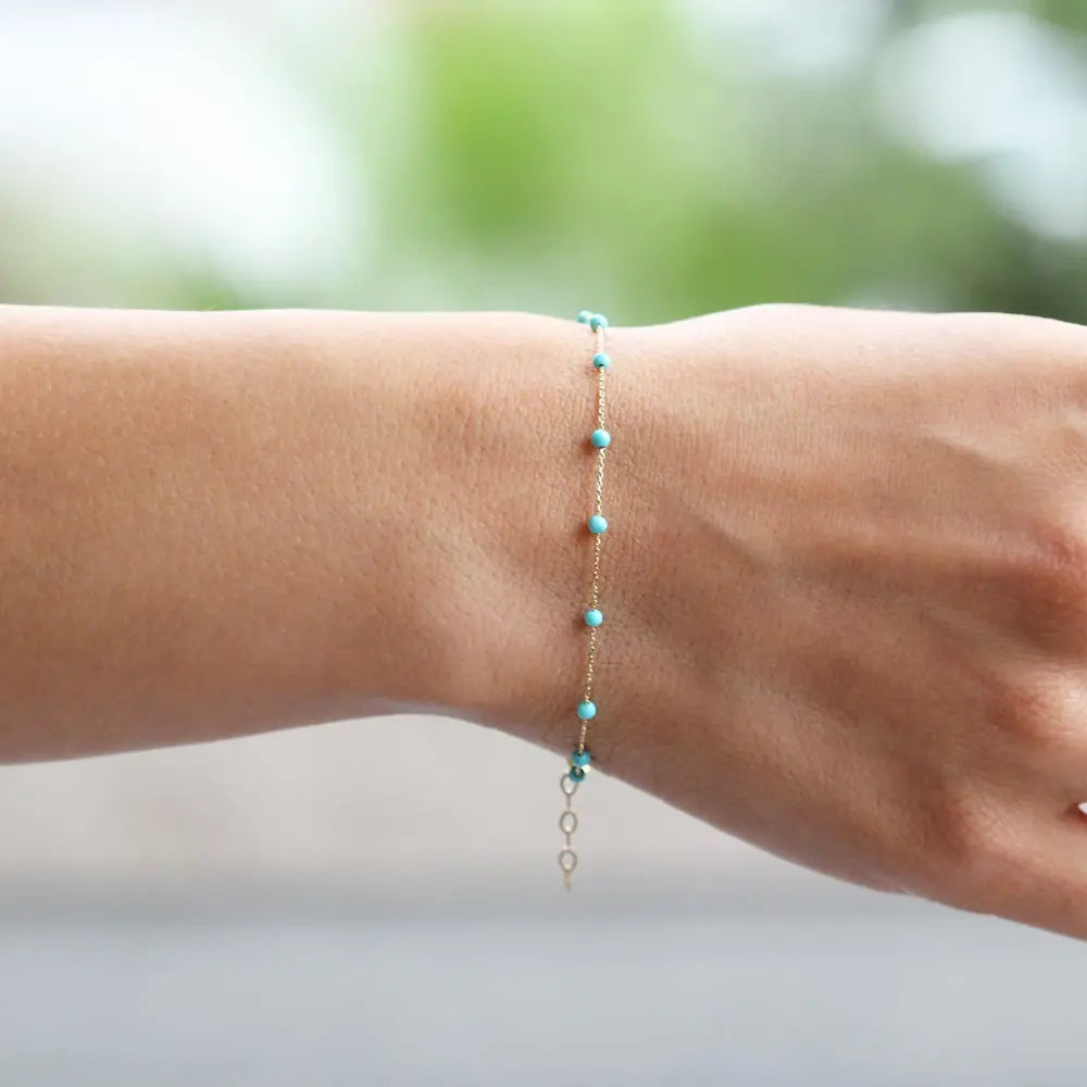 Bracelet or pierres turquoises 