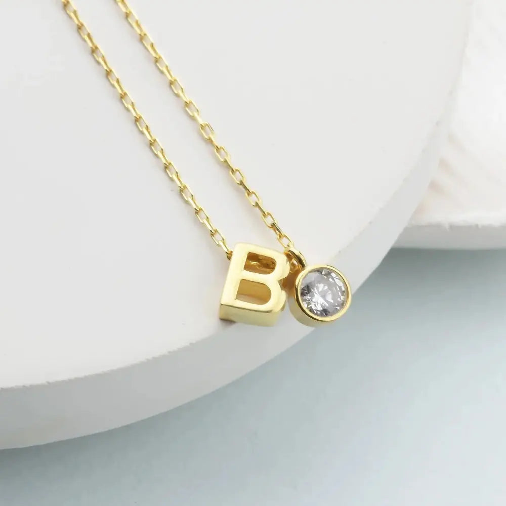 Pendentif initial argent 